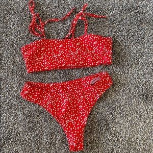 Size small red bikini with white floral print